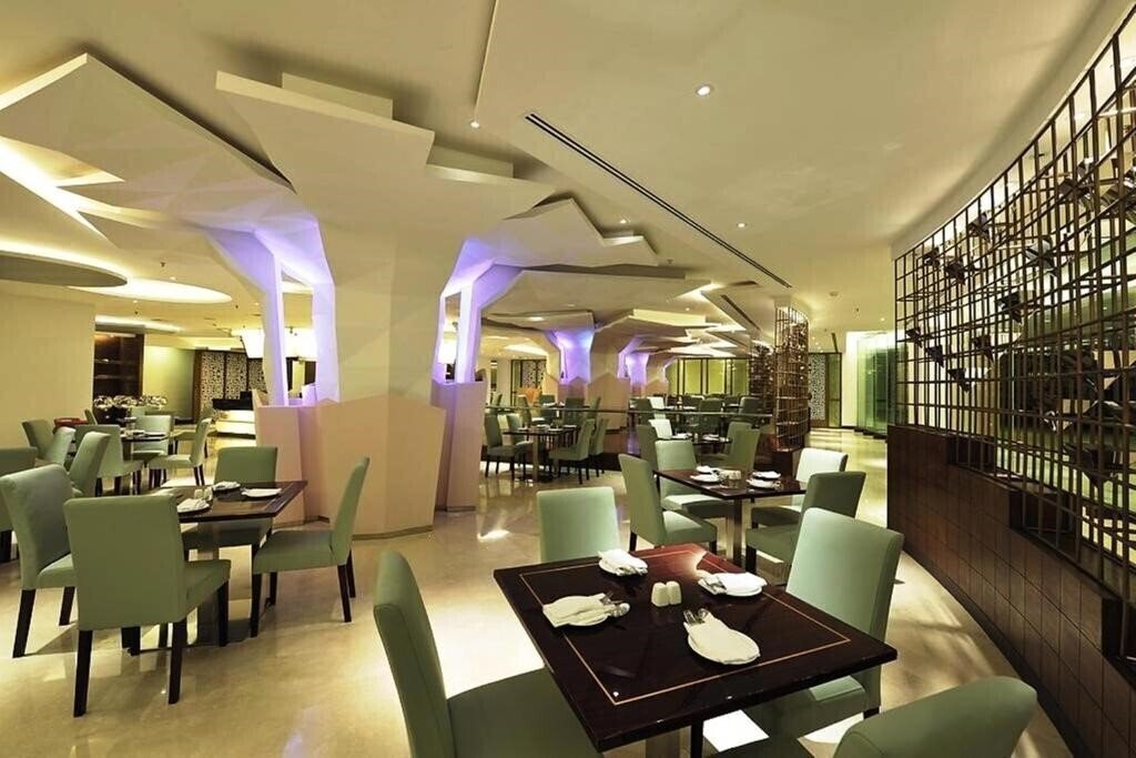 Ming Garden Hotel & Residences 4* суреті