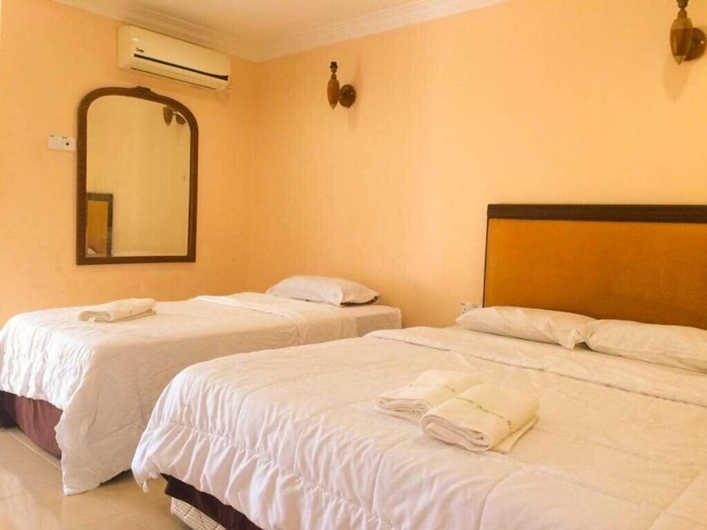 Penarak Bamboo Beach Motel 2* суреті