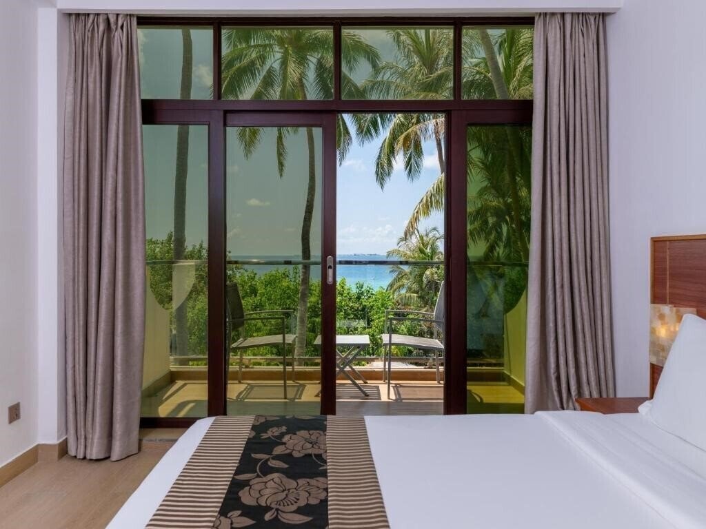 Фото Kaani Grand Seaview Guest House 3*