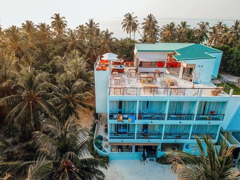 Фото Bliss Dhigurah Guest House 3*