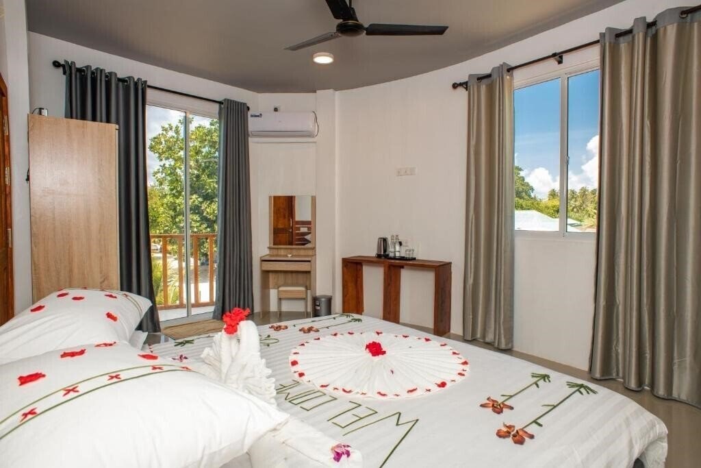 Изображение Finolhu Inn Dhigurah Guest House гостиный двор