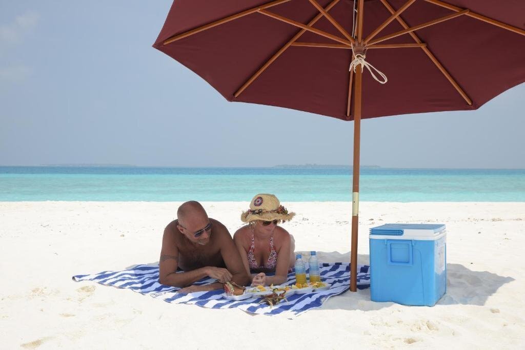 Фотография Madi Finolhu Guest House гостиный двор