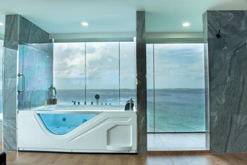 Отель Clarks Exotica Maldives Guest House гостиный двор