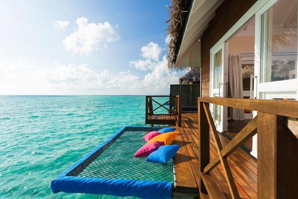 Отель Sun Aqua Vilu Reef Beach & Spa 5*