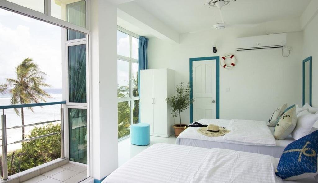 Фото The Aquzz Beach Guest House 1*