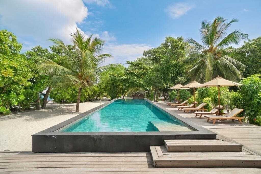Фото The Barefoot Eco Hotel 4*