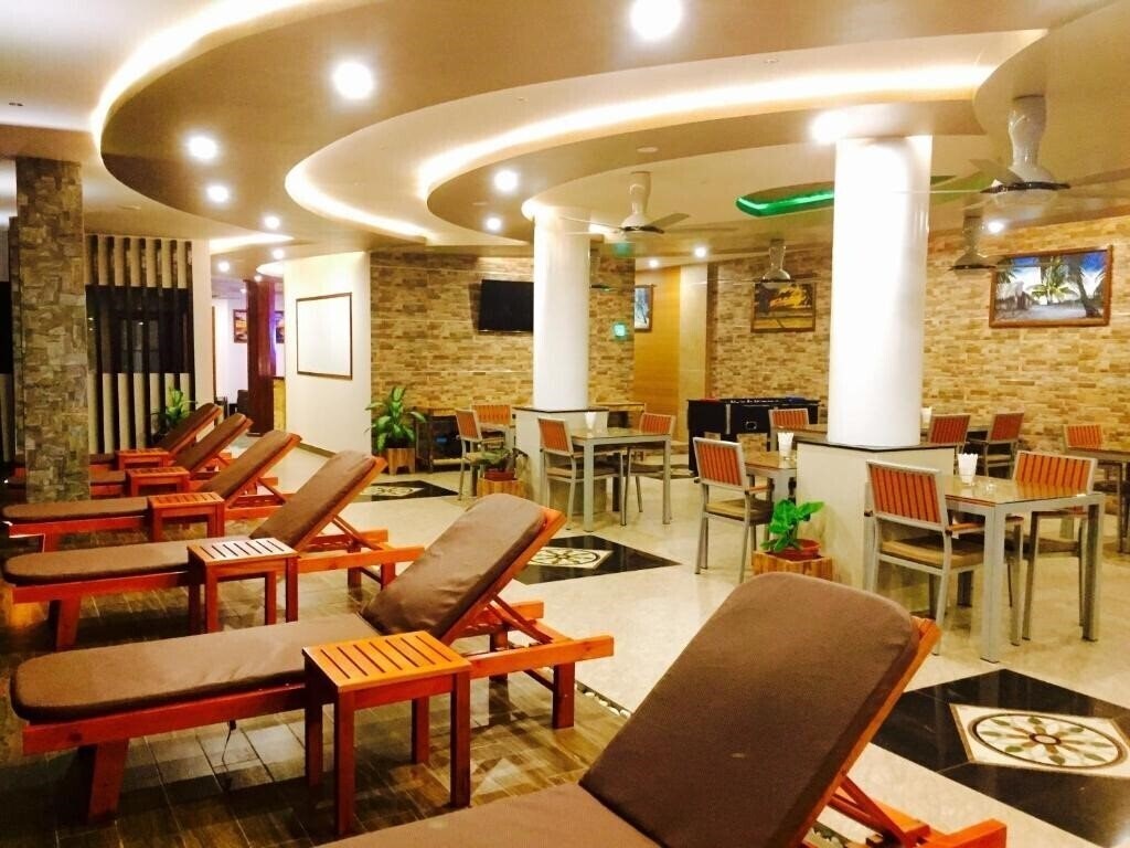 Фотография Triton Beach Hotel 3*