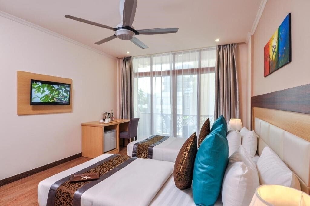 Изображение Triton Beach Hotel 3*