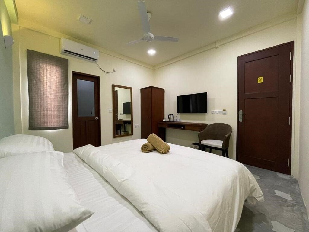 Courtyard Guesthouse 3* суреті