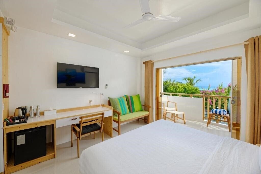 Luau Beach Inn Maldives Guest House гостиный двор суреті