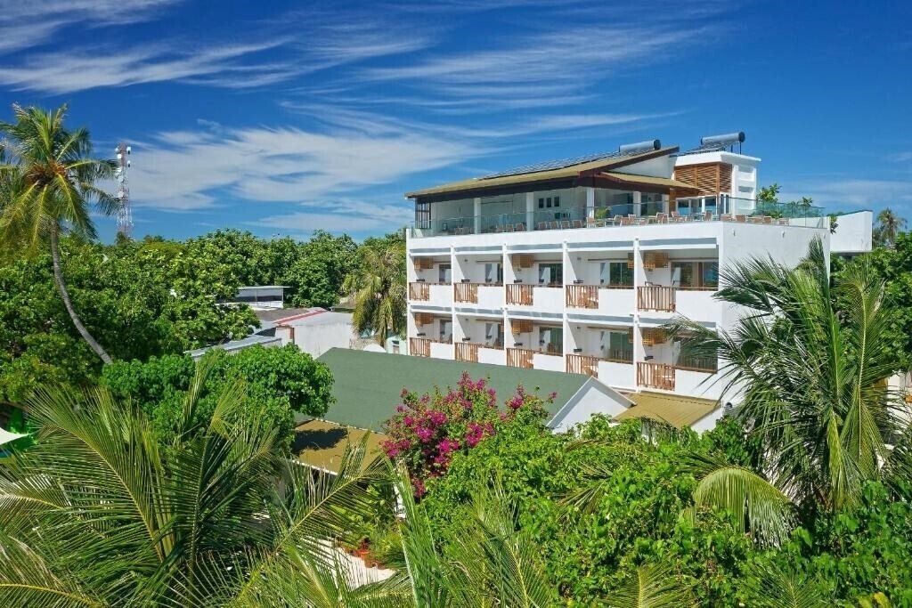 Luau Beach Inn Maldives Guest House гостиный двор суреті