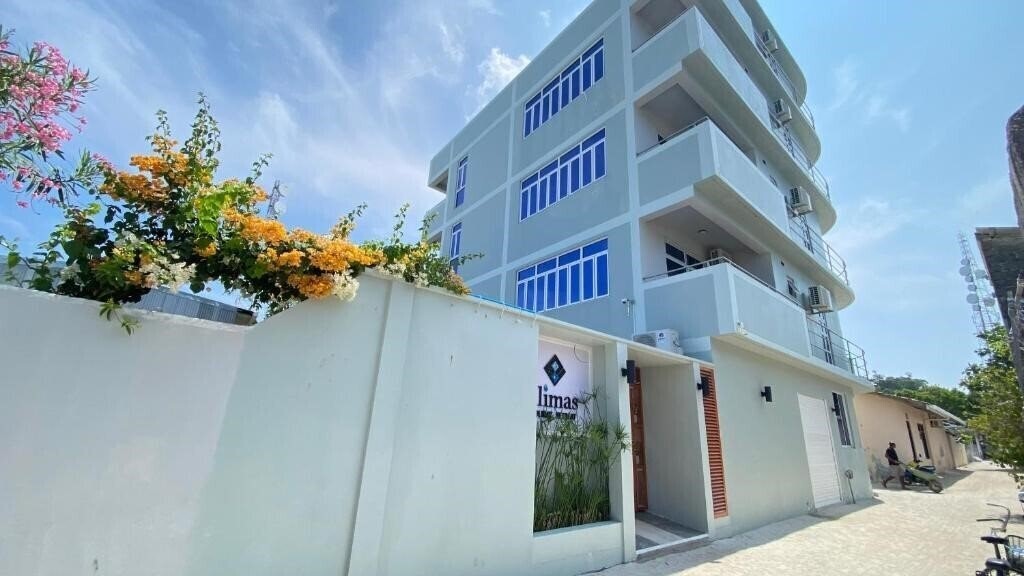 Alimas Retreat Felidhoo Guest House гостиный двор суреті
