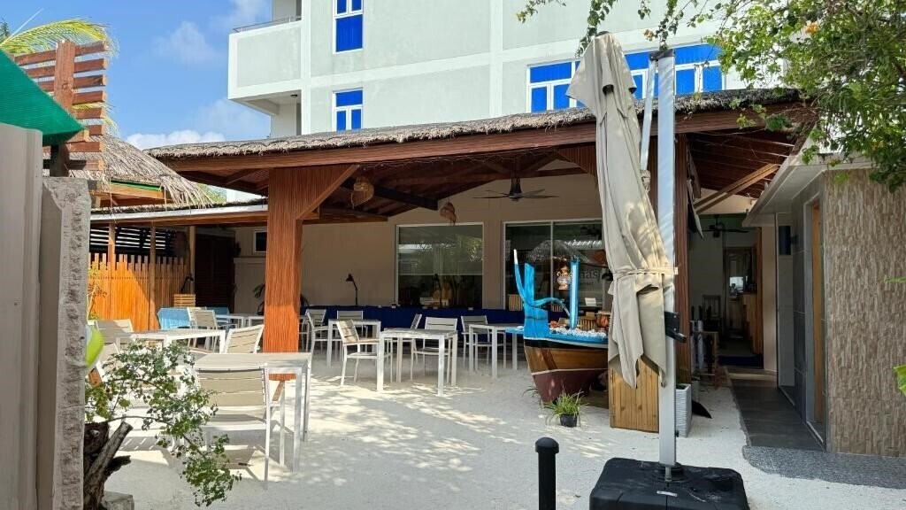 Alimas Retreat Felidhoo Guest House гостиный двор фотосуреті
