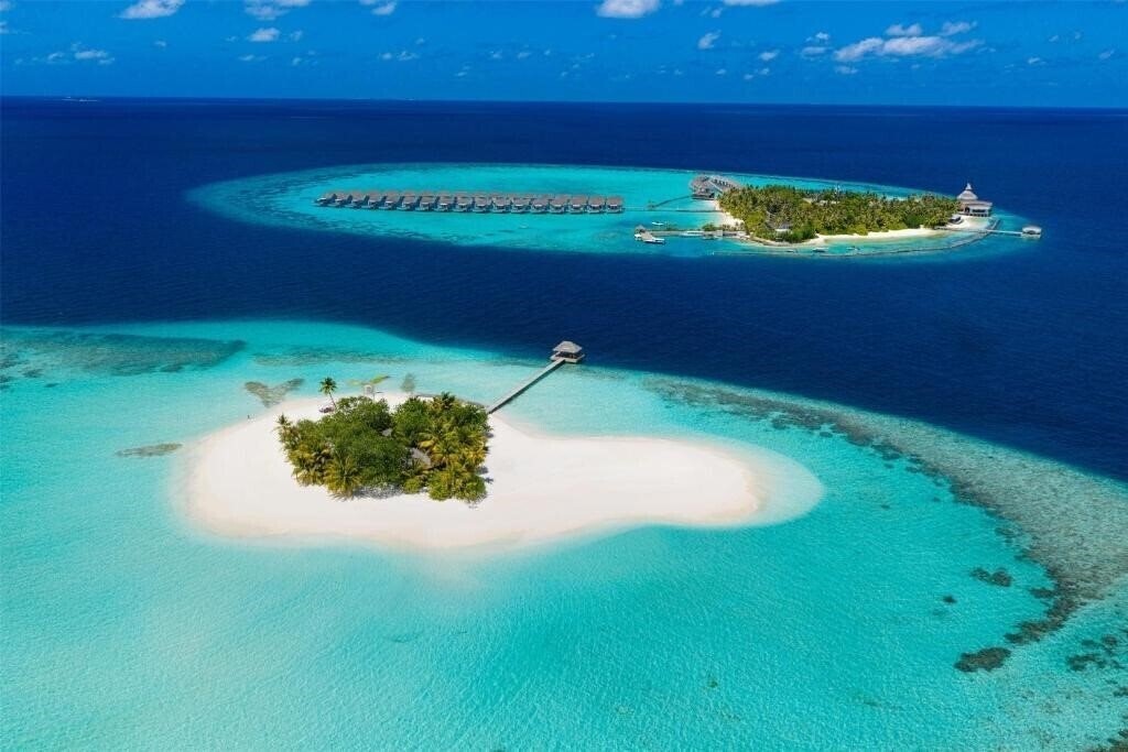 Фото Outrigger Maldives Maafushivaru Resort 5*