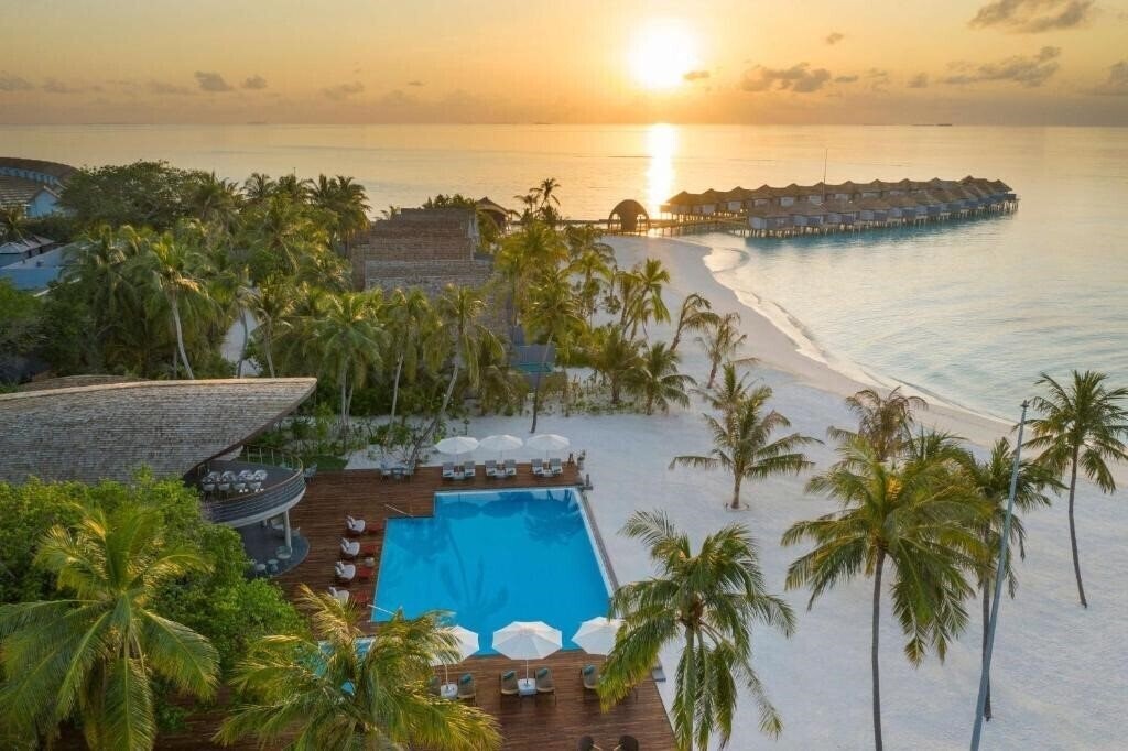 Фотография Outrigger Maldives Maafushivaru Resort 5*