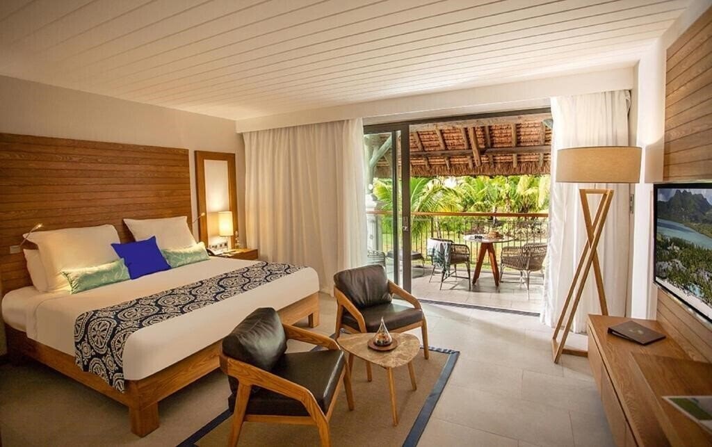 Фото Paradis Beachcomber Golf Resort & Spa 5*