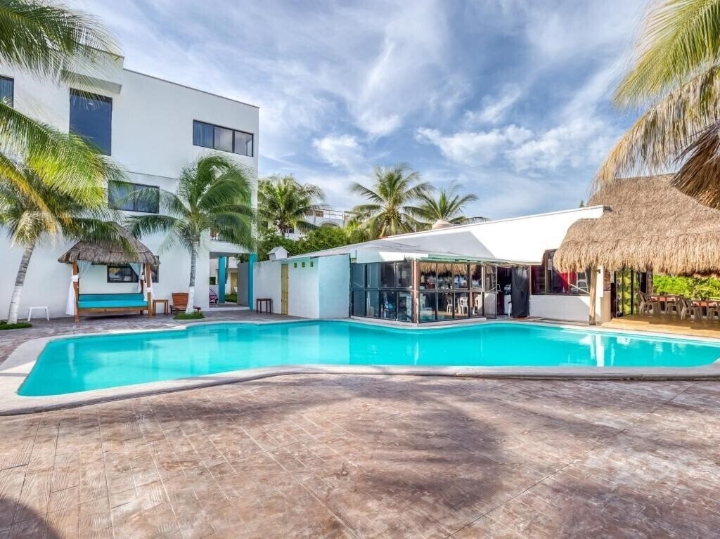 Фотография Hotel Ojo De Agua 3*