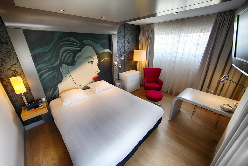 Apollo Almere City Centre 4* суреті