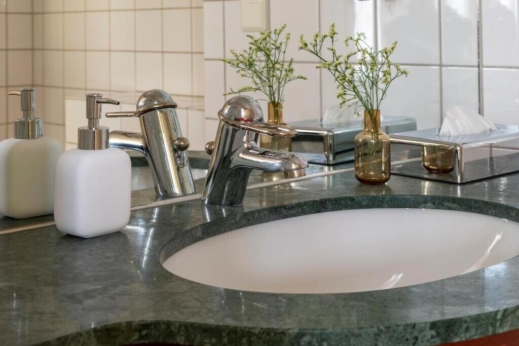 First Hotel Millenium 4* суреті