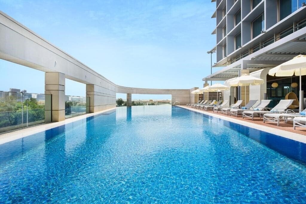 Adagio Abu Dhabi Al Bustan апартаменты фотосуреті