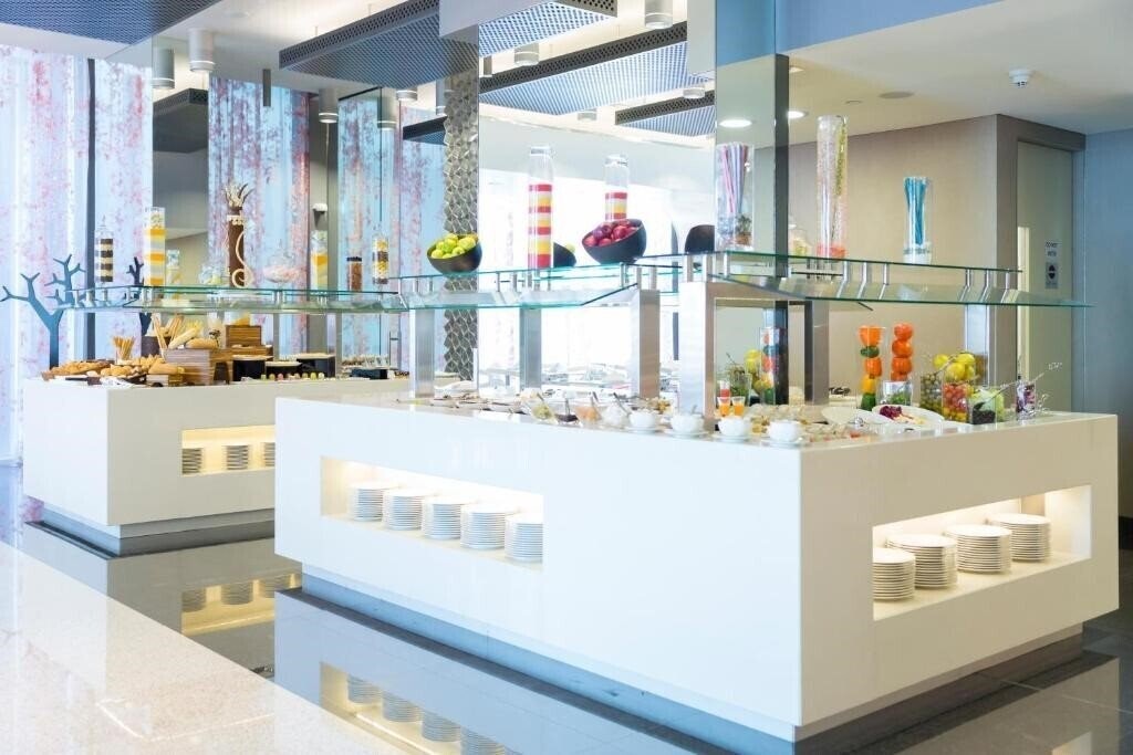 Adagio Abu Dhabi Al Bustan апартаменты суреті