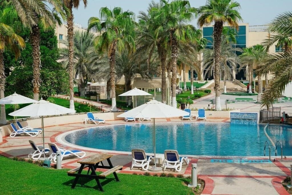 Millennium Central Mafraq Hotel 4* суреті