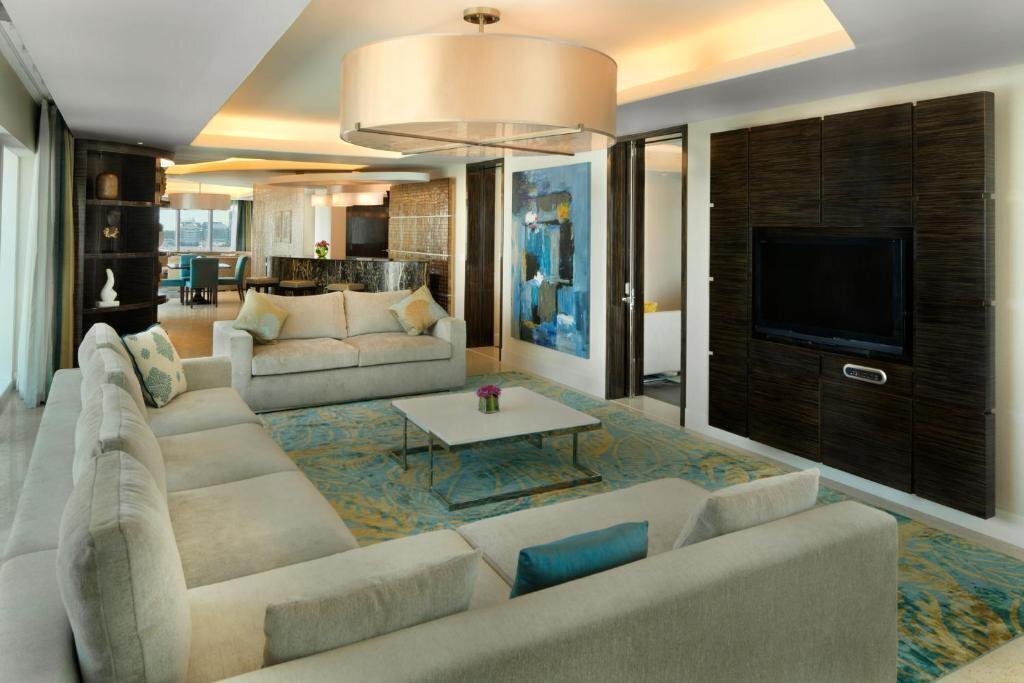 Фото Millennium Al Rawdah Hotel Abu Dhabi (ex. Millennium Capital Gate Abu Dhabi, Hilton Capital Grand Abu Dhabi) 5*