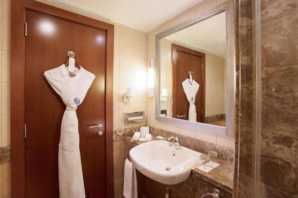 Al Rawda Rotana Suites 4* фотосуреті