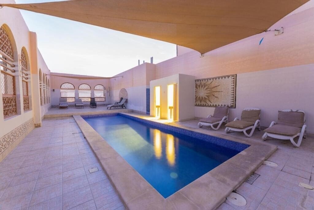 Фотография Ewan Hotel Apartments 4*