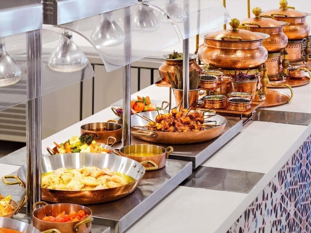 Фотография Novotel Dubai Al Barsha Hotel 4*