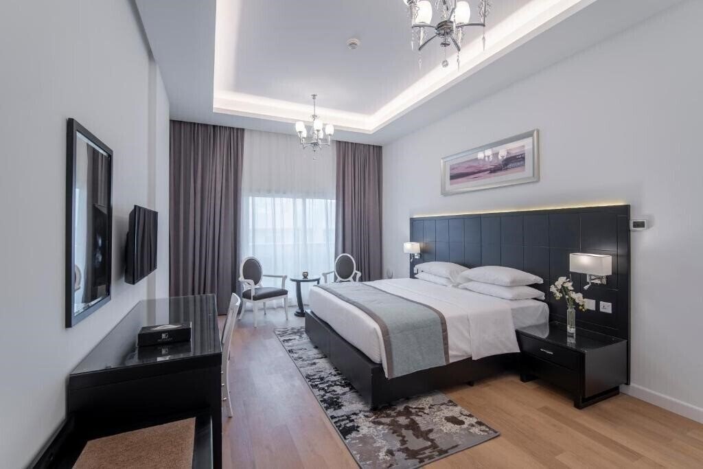 Отель Rose Garden Hotel Apartments Al Barsha 4*