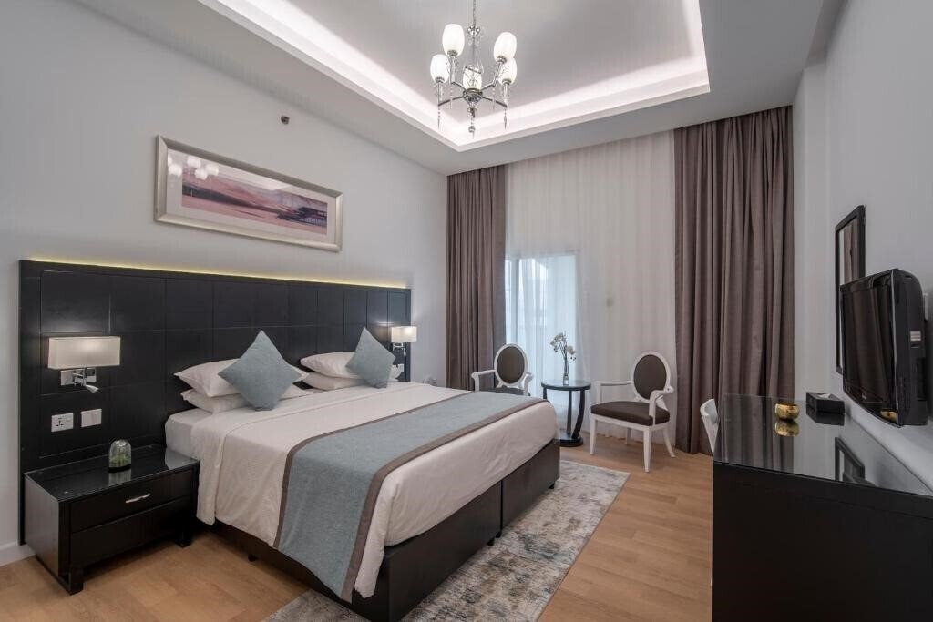 Фото Rose Garden Hotel Apartments Al Barsha 4*