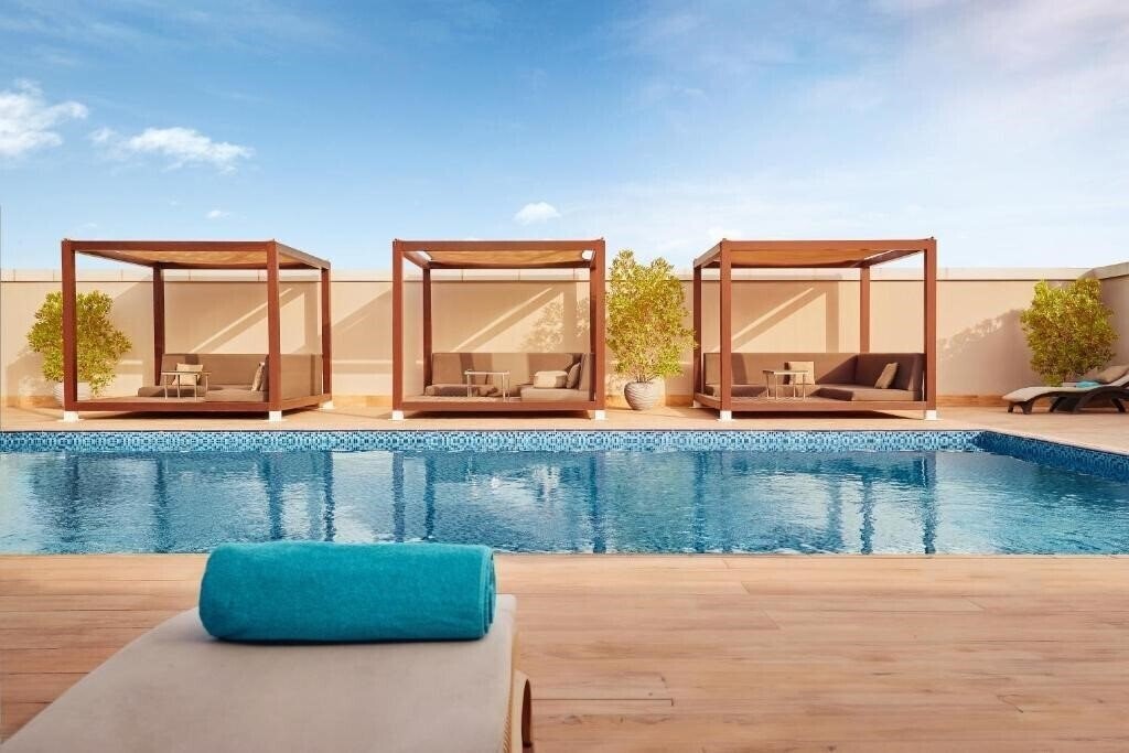 Flora Inn Hotel 4* суреті