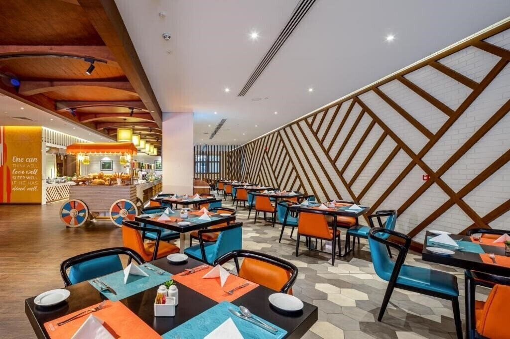 Flora Inn Hotel 4* суреті