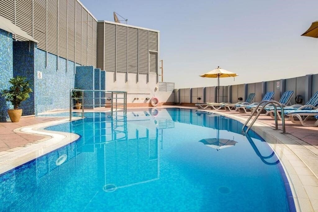 Pearl Executive Hotel Apartment (ex. Pearl Park Inn) апартаменты қонақ үйі
