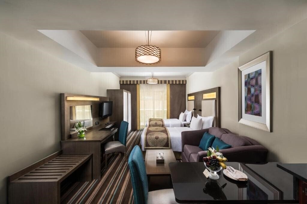Фото Savoy Central Hotel Apartments 4*