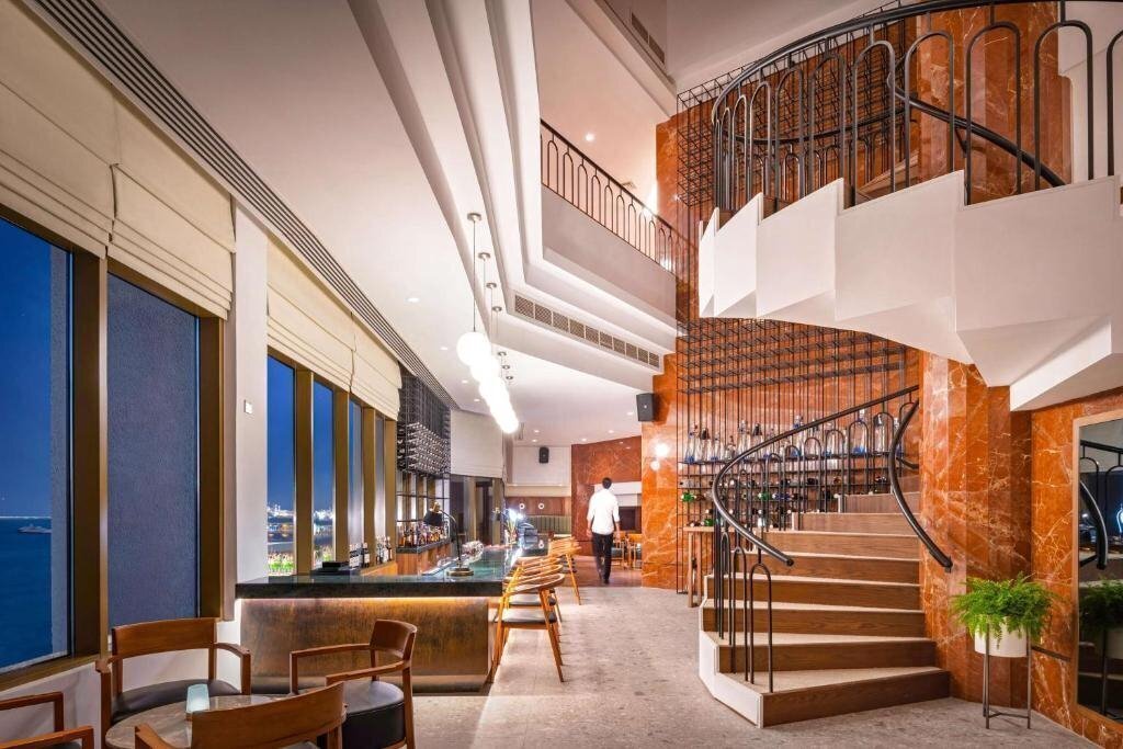 JA Beach Hotel (ex. Ja Jebel Ali Beach Hotel) 5* суреті