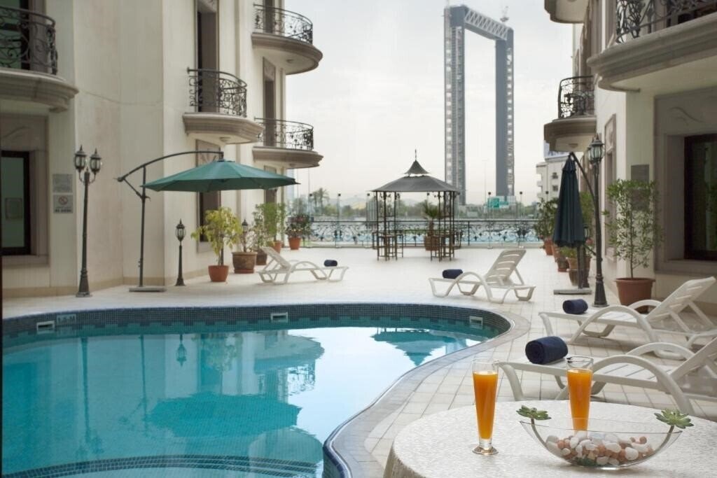 Al Waleed Holiday Homes (ex. Al Waleed Palace - Oud Metha Appartments) 3* суреті