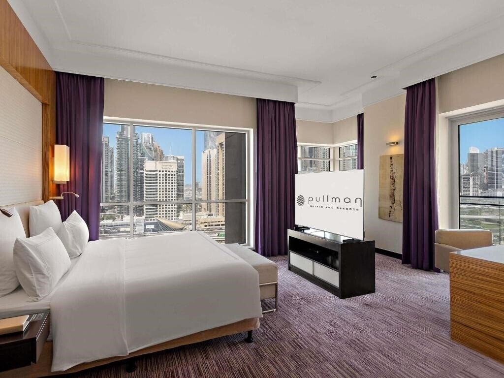 Фото Pullman Dubai Jumeirah Lakes Towers 5*