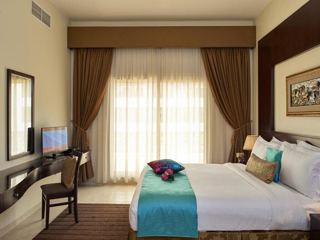 Фото Arabian Dreams Hotel Apartments 4*