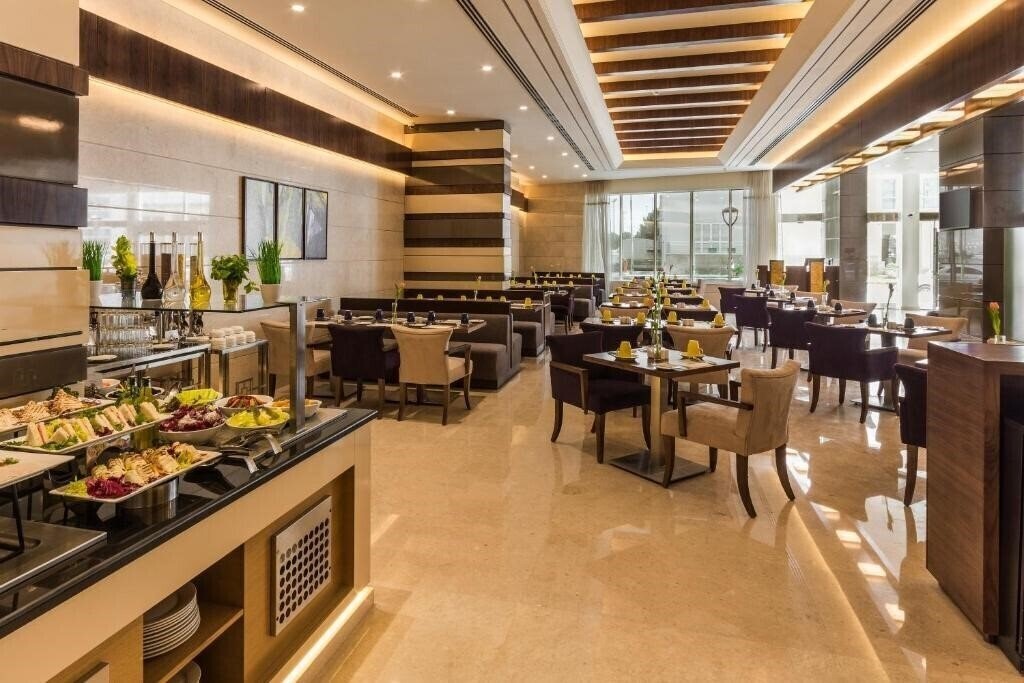 Изображение Golden Tulip Media Hotel 4*