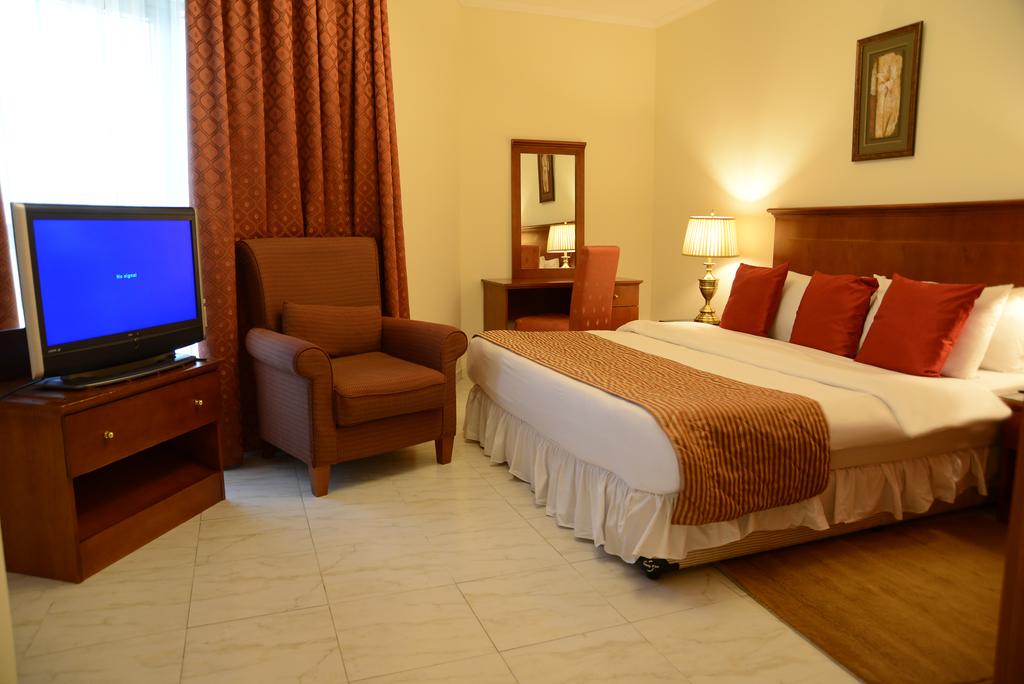 Фото Legacy Hotel Apartments 3*