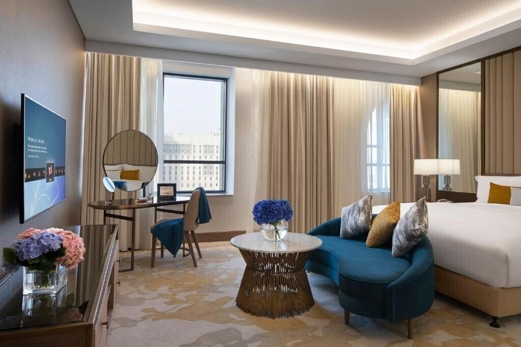 Фото Al Jaddaf Rotana 5*