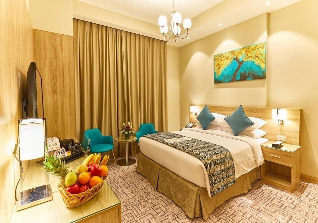 Rose Plaza Hotel 3* суреті