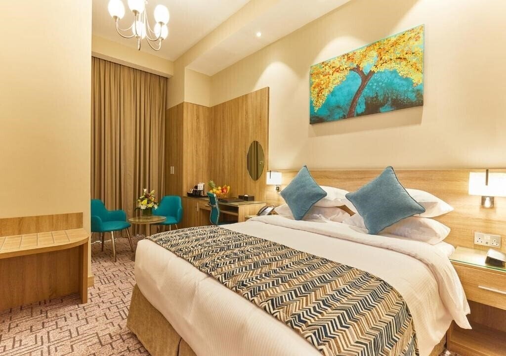 Rose Plaza Hotel 3* суреті