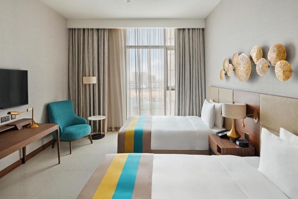 Фото Holiday Inn Dubai Al Maktoum Airport 4*