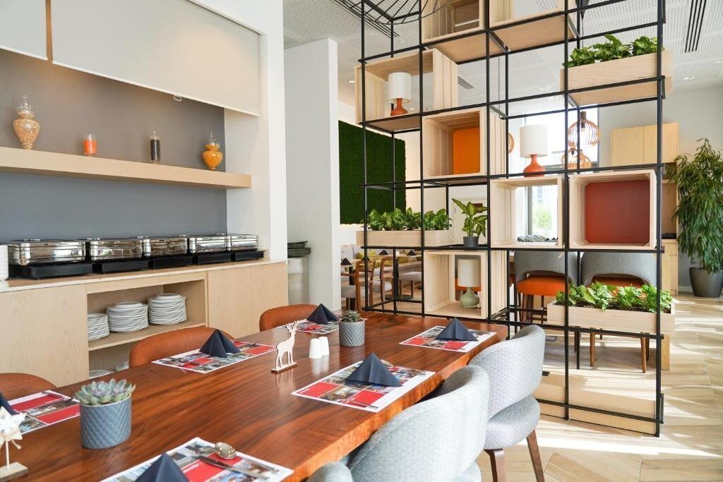 Intercity Hotel Dubai Jaddaf Waterfront 4* фотосуреті