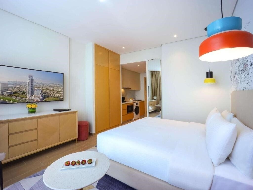 Adagio Jumeirah Village Triangle 4* фотосуреті