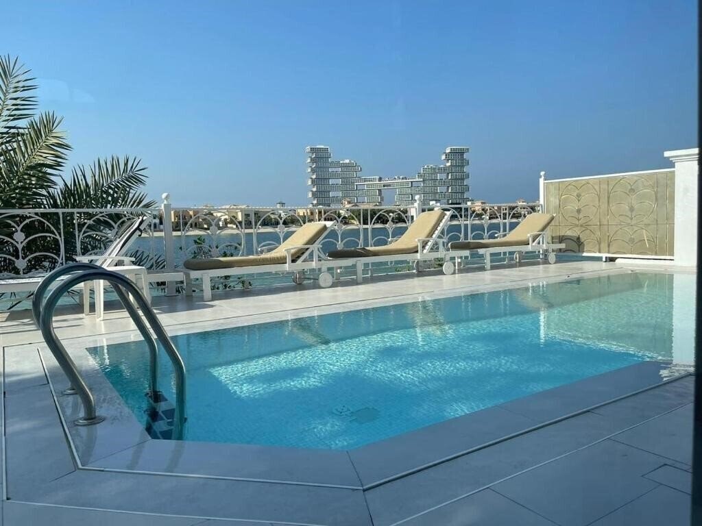 Отель The Palm Jumeirah Villas 5*