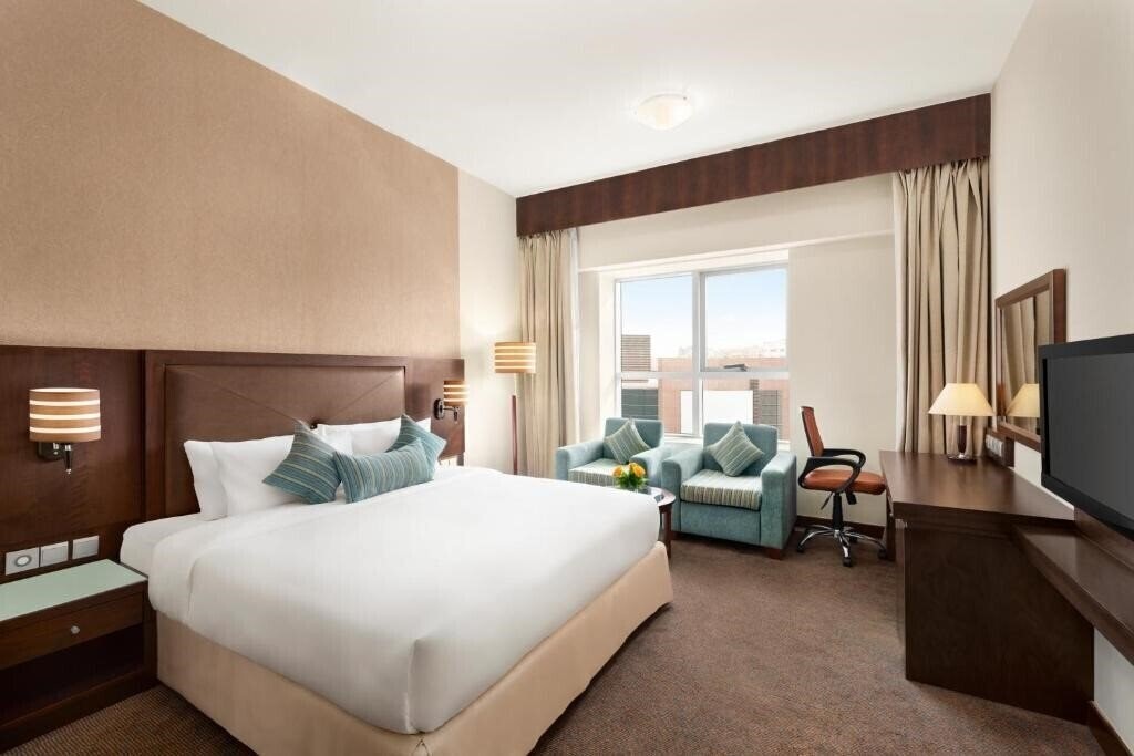 Фото Ramada by Wyndham Dubai Deira 4*